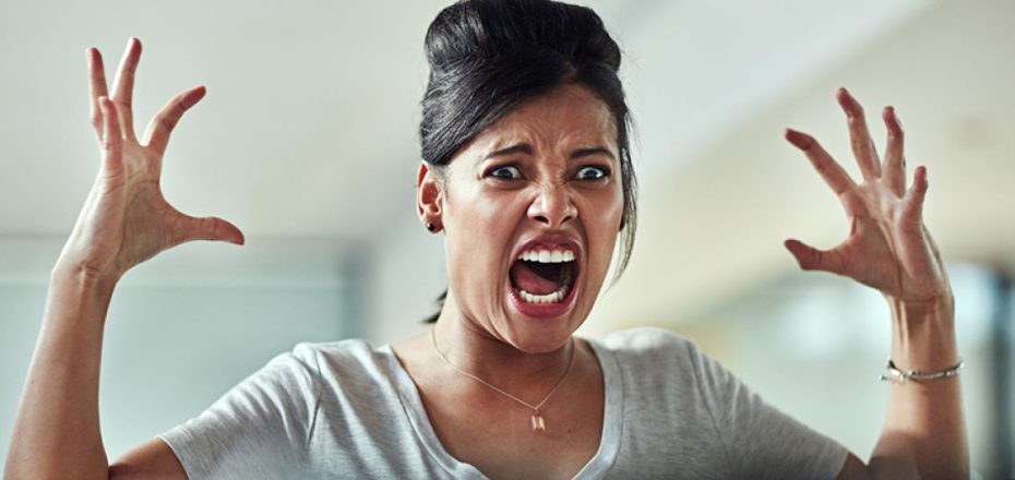 Shot of a frazzled young businesswoman having an outburst in the office